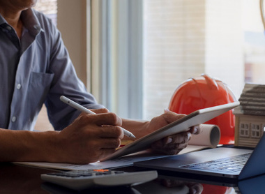 iStock Licence man laptop hard hat.jpg